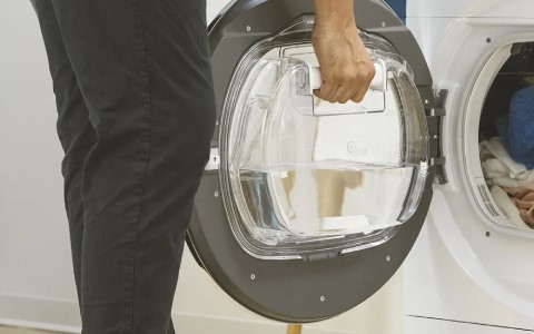 Tumble dryers with in-door water tank.