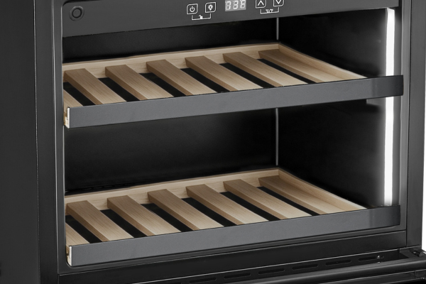 Empty beech wood shelves and LED side lights in the DeSantii wine cooler