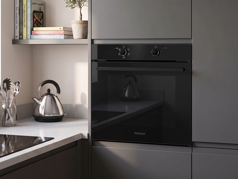 DeSantii oven with a triple-glazed dark tinted glass door in a grey kitchen
